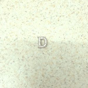 "D" charm
