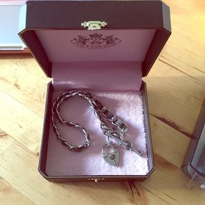 Juicy Couture "Love Me" Necklace in silver.