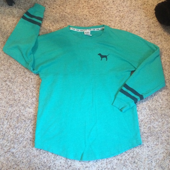 Green long sleeve love pink shirt.