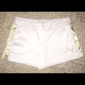 White shorts with gold accents on the side!