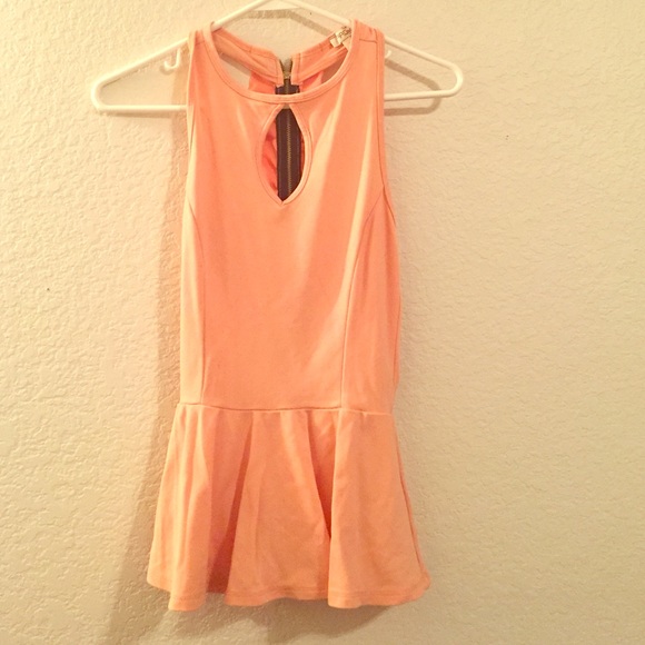 Coral peplum top with beautiful back