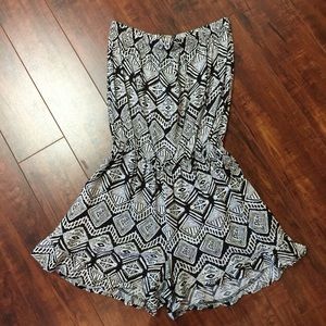 Ruffle bottom black romper (s)