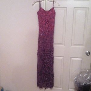 Pink faded to purple beaded prom dress.