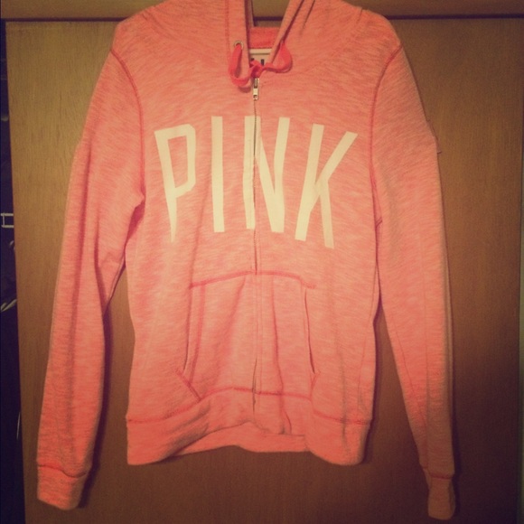 Pink zip up sweater/jacket.