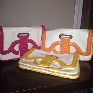 All 3 clutches: hot pink, orange, mustard/yellow.
