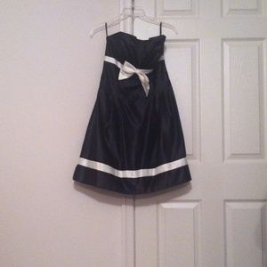 Black cocktail dress with bow