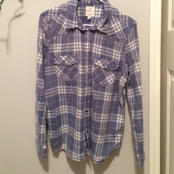 a plaid blue and white long sleeve shirt