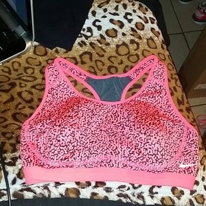 Bright coral Nike sports bra