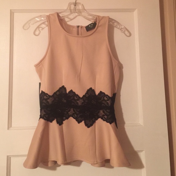 A X nude peplum top with black lace
