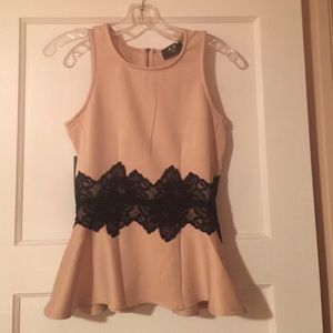A X nude peplum top with black lace