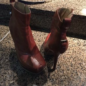 Light brown leather boot.