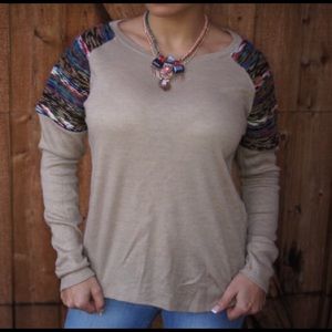 Raglan Style sweater with shoulder details