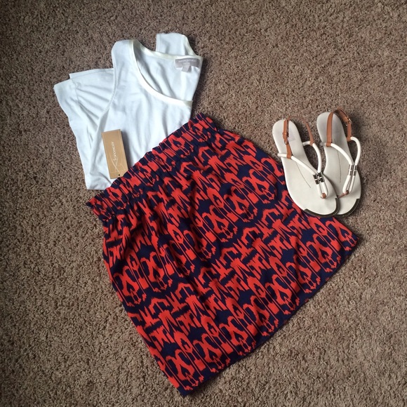Francesca's Collections Dresses & Skirts - 🎉HP-  Navy & orange printed skirt- NWT