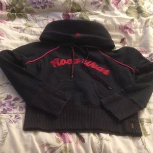 Black and red name brand sweater.