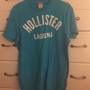 men's Hollister bright blue and white tshirt
