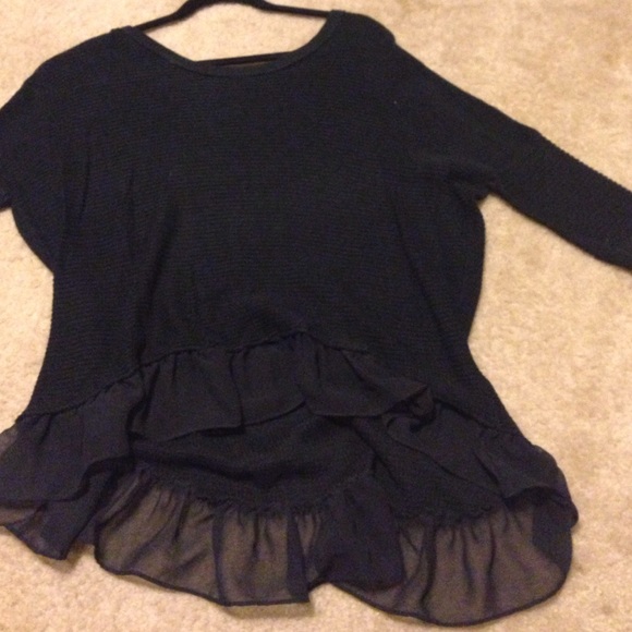 Black sweater with ruffle across the bottom