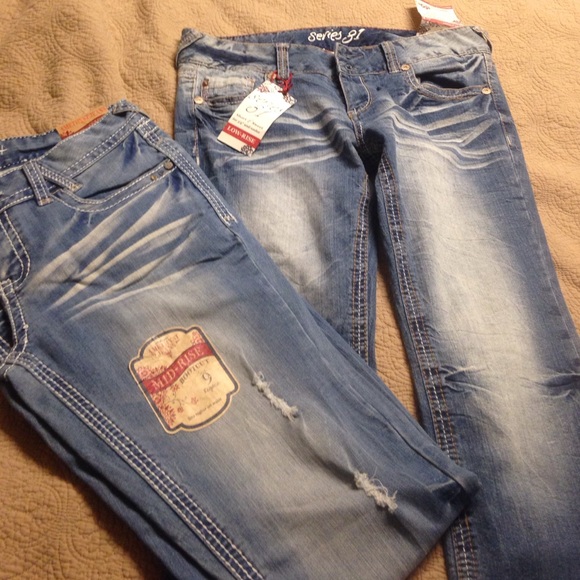 2 Pairs of boot cut jeans size 9