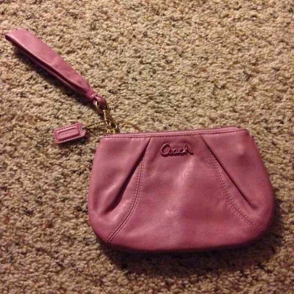 ✨REDUCED✨LIKE NEW Coach wrislet in wisteria