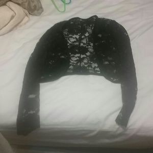 Outerwear goes over a dress or strapless shirt