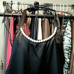 Dressy black apron with pearl neckline