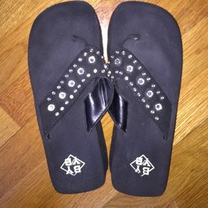Black platform embellished flip-flops