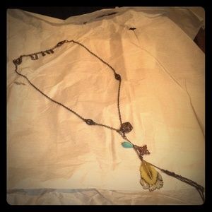 Lucky Brand feather charm necklace.