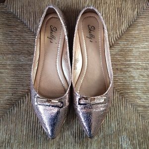 Rose gold pointy toed flats