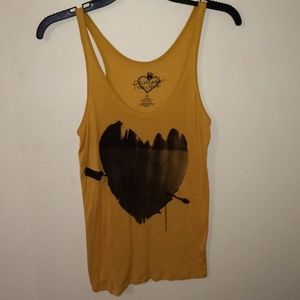 yellow racer back tank top with heart graphic