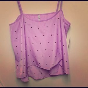 Purple flowy top with studs.