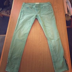 Green skinny jeans