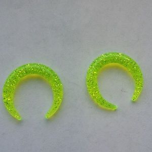 Yellow earrings gauges pinchers