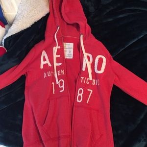 Orange colored Aeropostale zip up