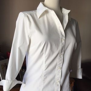 Express stretch 3/4 sleeve fitted button down top