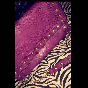 Purple crossbody purse with gold chain