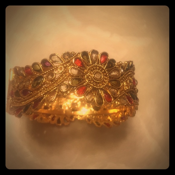 Gold Asian design bracelet/bangle.