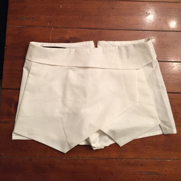 Asymmetrical white skirt