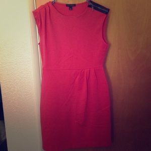 Has zipper on the shoulder very flattering fit.