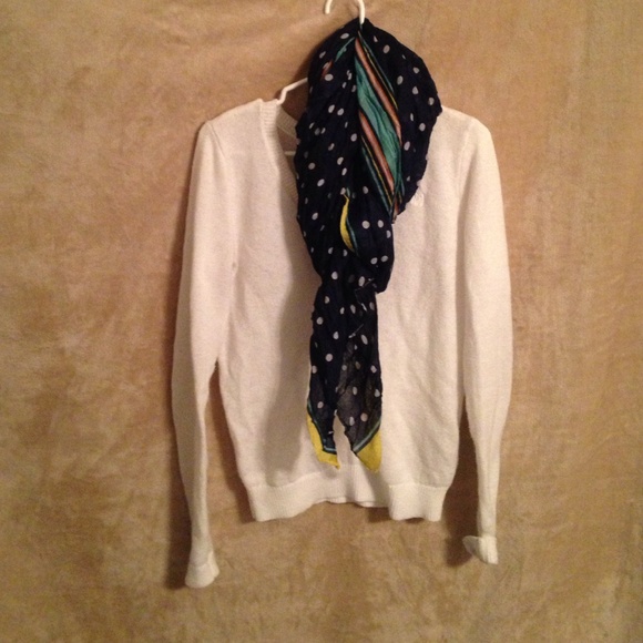 Navy blue polka dotted scarf with colorful stripes