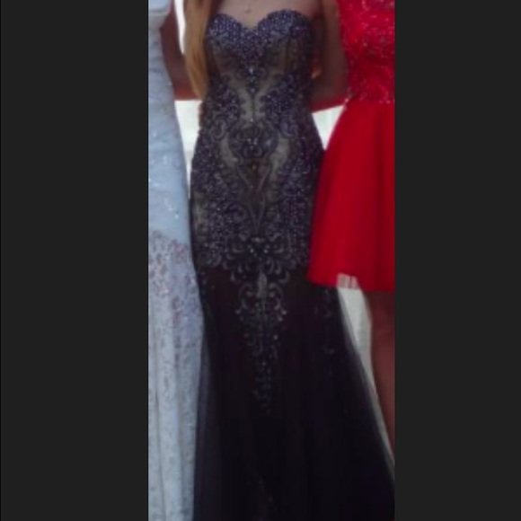 Black and tan, long, beaded Jovani dress.