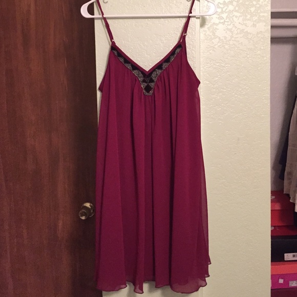 Maroon dress.