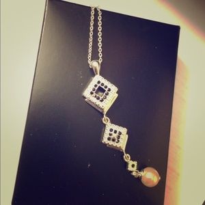 Beautiful black and white diamond accent necklace.