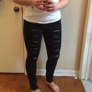 Destroyed black denim jeans