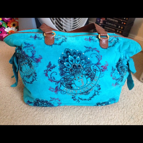 Turquoise Juicy Couture purse.