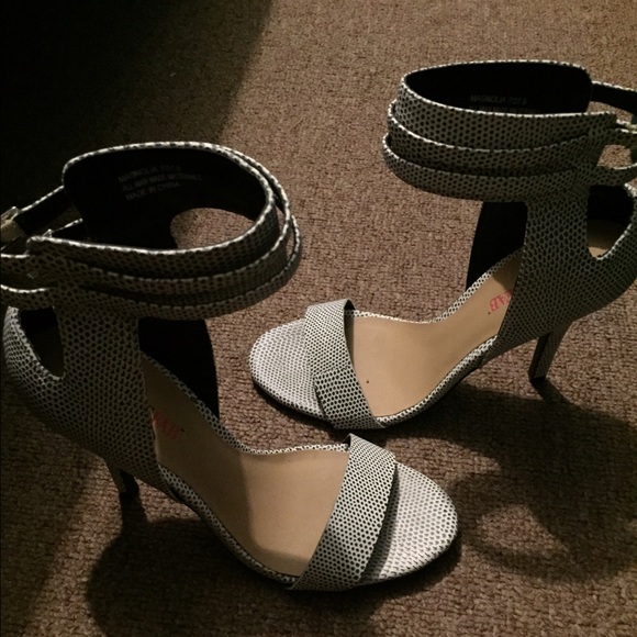 Black and white strap sandal heels