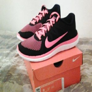 Brand new Nike free pink and black shoes