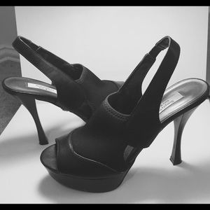 Black sling-back pumps