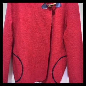Red coat with black design wooden button- not worn