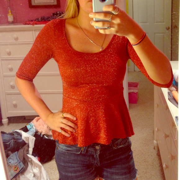 Red shimmery peplum top