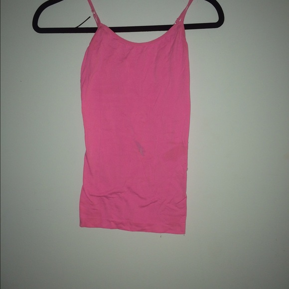 Pink neon tank top. Small spot