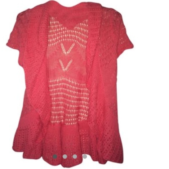 Peach cardigan.